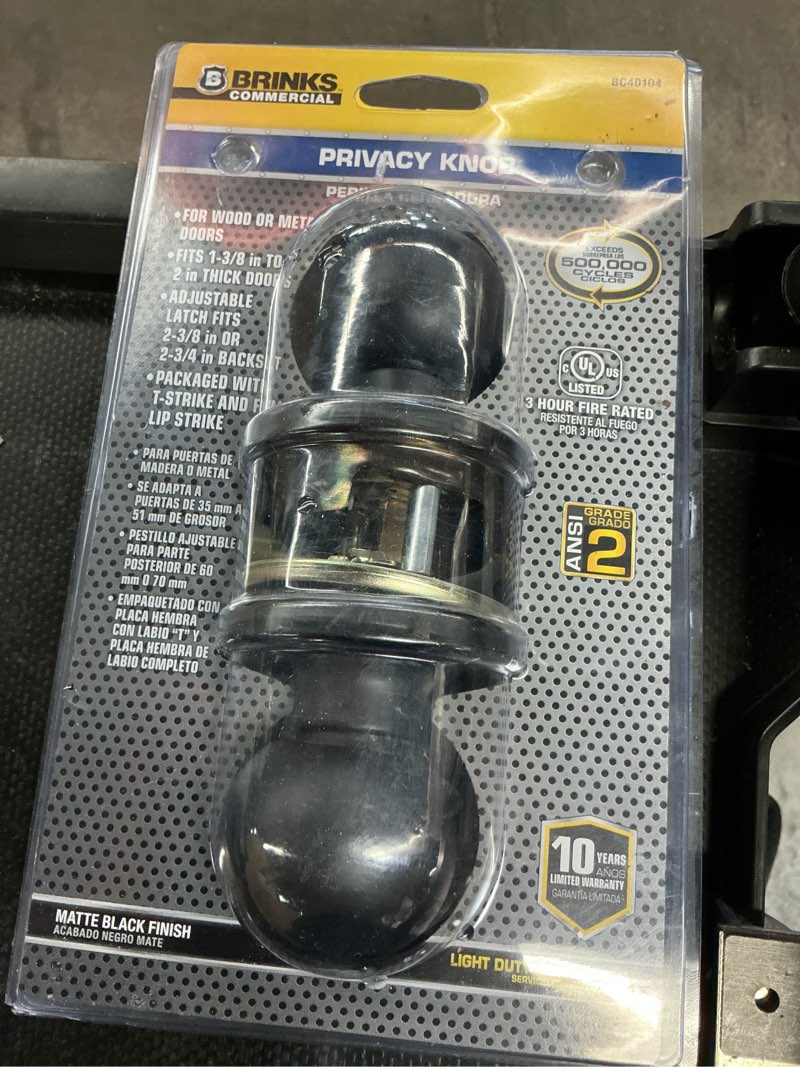 Condition photo showing As Is for brinks commercial matte black interior bed/bath hall/closet privacy door knob
