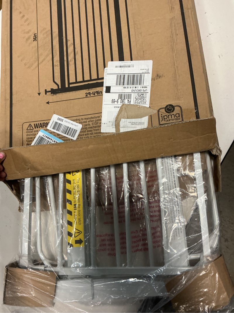 Condition photo showing New/Like New for regalo safety 36" extra tall and 49" wide baby gate for doorways & bottom of stairs, pressure mounted walk through baby gate for toddlers & pets, tested & safe, american designed, american owned white 29-49"w x 36"h