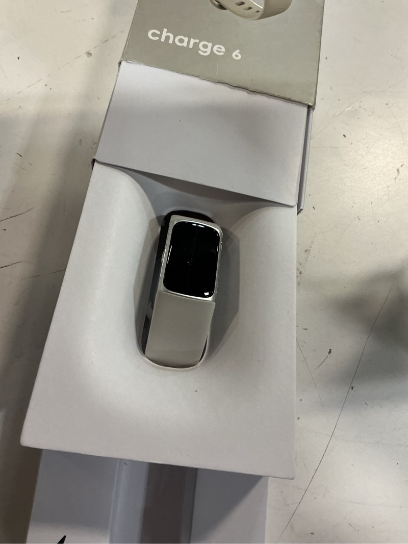 Condition photo showing Good Condition for fitbit charge 6 fitness tracker with google apps, heart rate on exercise equipment, 6-months premium membership included, gps, health tools and more, porcelain/silver, one size (s & l bands included) silver case w/ white band tracker