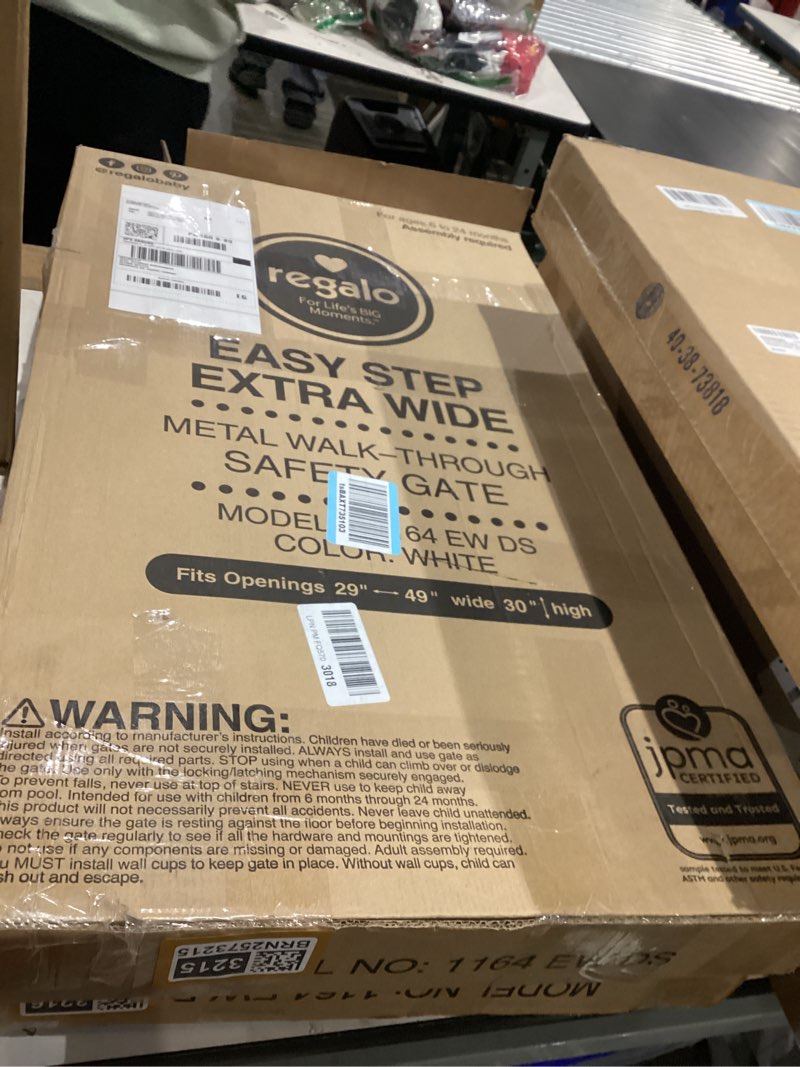Condition photo showing New/Like New for Regalo Easy Step 49-Inch Extra Wide Baby Gate, Includes 4-Inch and 12-Inch Extension Kit, 4 Pack of Pressure Mount Kit and 4 Pack of Wall Mount Kit White 29-49"W x 30"H