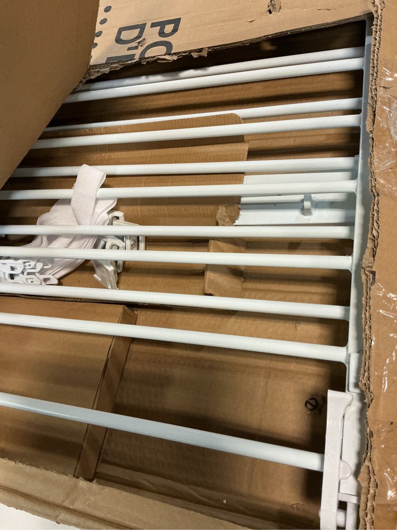 Condition photo showing As Is for regalo easy step 49-inch extra wide baby gate, includes 4-inch and 12-inch extension kit, 4 pack of pressure mount kit and 4 pack of wall mount kit white 29-49"w x 30"h