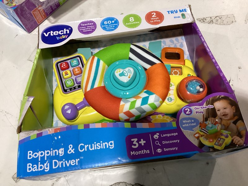 Condition photo showing New/Like New for vtech baby bopping & cruising baby driver plastic, plush baby and toddler toys