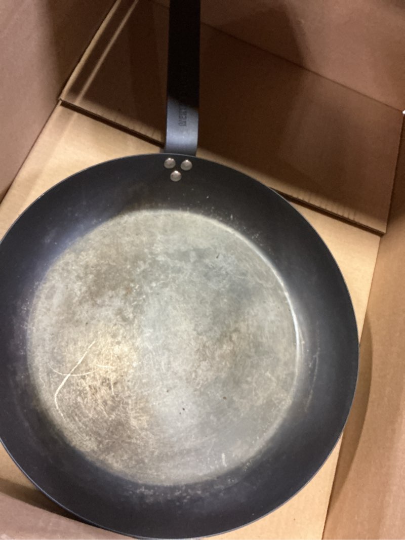 Condition photo showing As Is for merten & storck pre-seasoned carbon steel 12" frying pan skillet, fast heating, naturally nonstick, induction & oven safe, high-heat & open flame compatible, perfect for searing grilling & camping