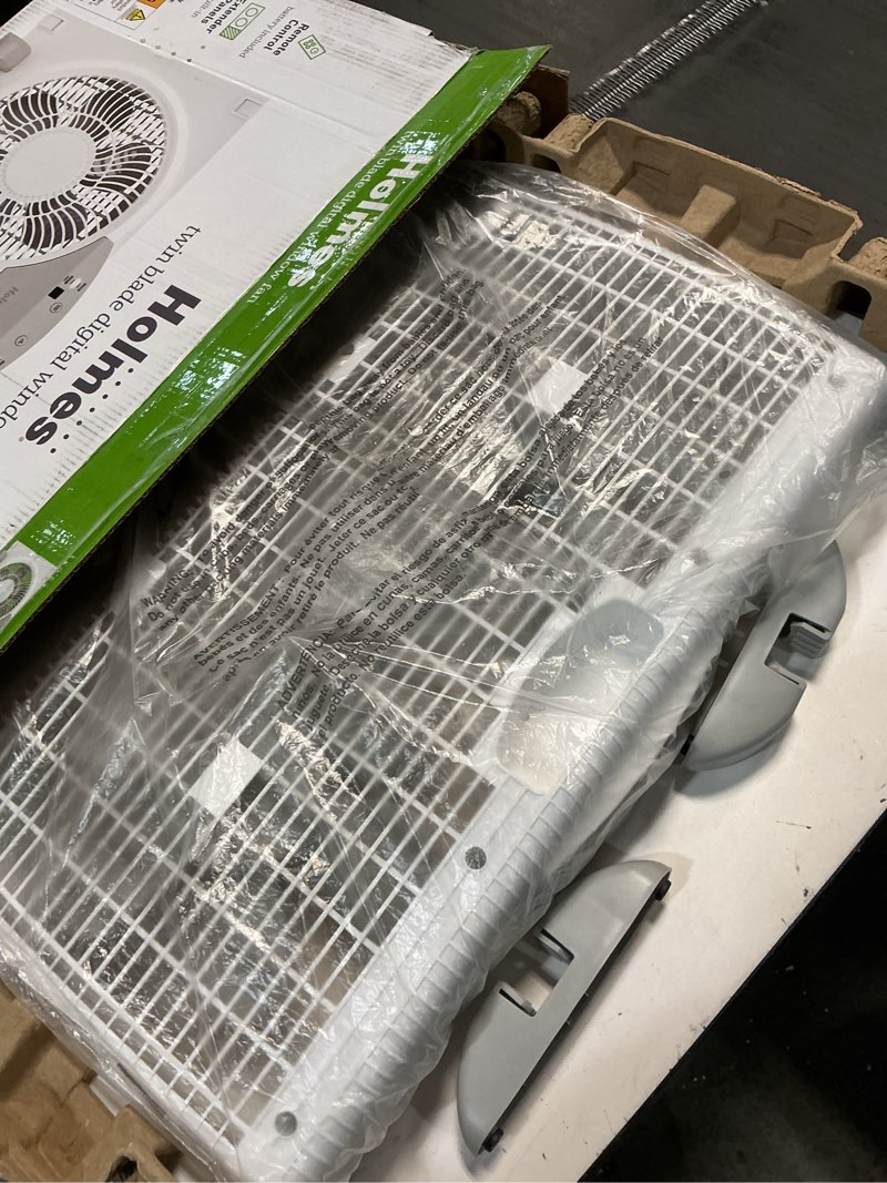 Condition photo showing New/Like New for HOLMES 9" Twin Digital Window Fan, Reversible Airflow Blades, In/Out Exchange, 3 Speeds, Built-In Extender Panels, Ideal for Home, Bedroom or Office, Remote Control, White Digital Control w/ Remote 9 Inch