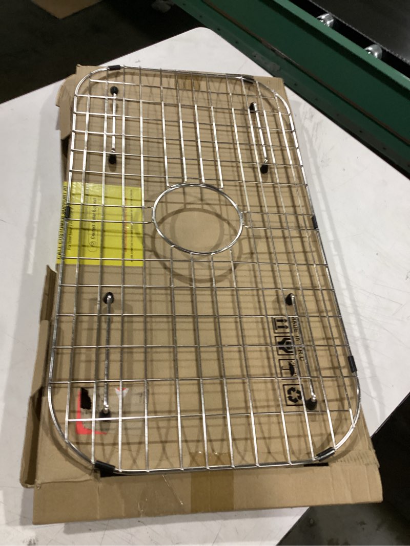 Condition photo showing Good Condition for center drain stainless steel sink grid