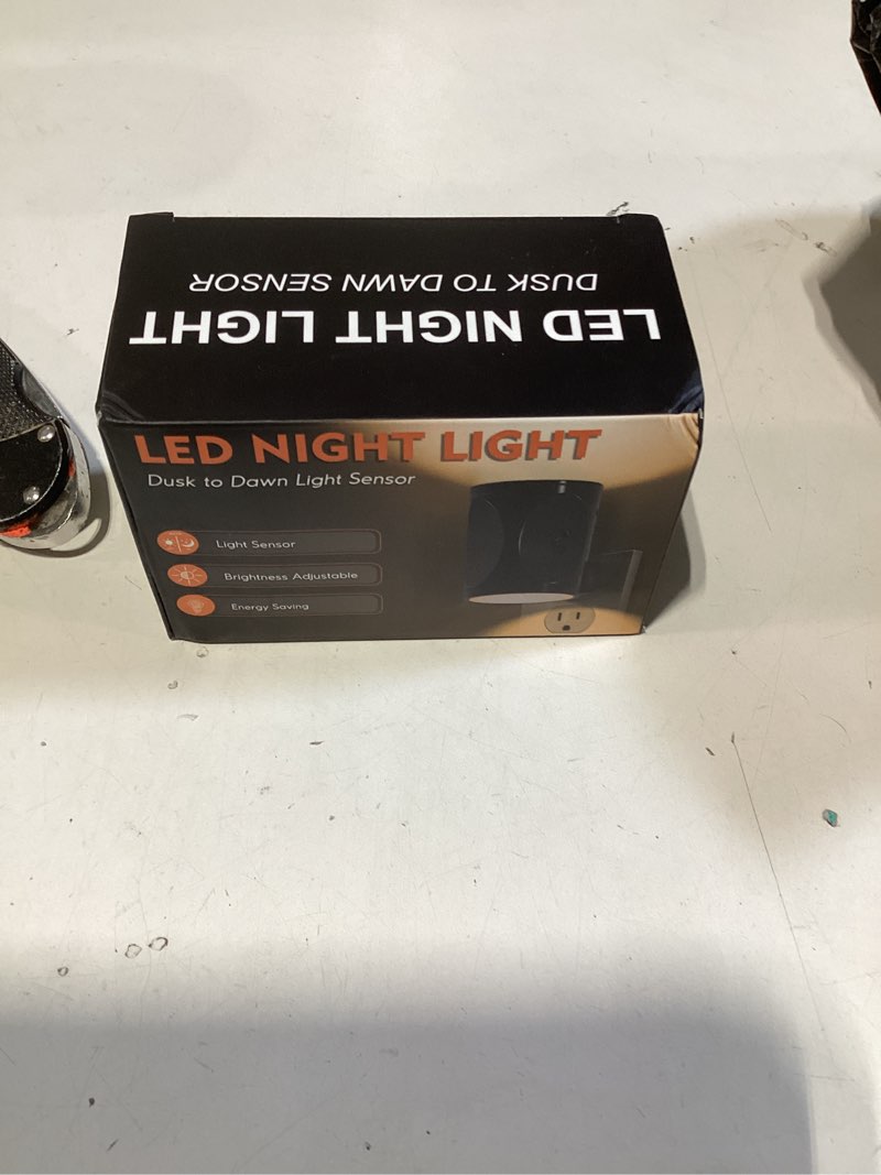 Condition photo showing New/Like New for briignite night lights plug into wall, modern led night light plug in, dusk to dawn sensor, soft white 3000k, 0-100lm adjustable brightness, dimmable nightlight for hallway, bedroom, stairway, 2 pack black-3000k 2 pack