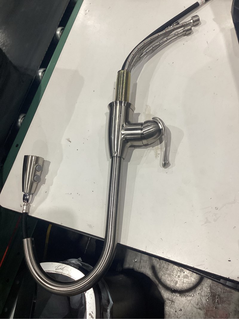 Condition photo showing As Is for project source tucker stainless steel single handle pull-down kitchen faucet with sprayer (deck plate included)