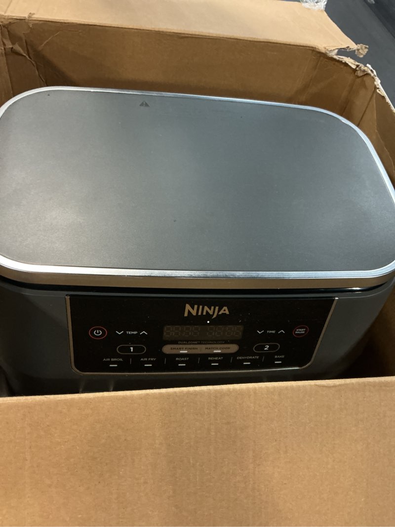 Condition photo showing As Is for Ninja DZ201 Foodi 8 Quart 6-in-1 DualZone 2-Basket Air Fryer with 2 Independent Frying Baskets, Match Cook & Smart Finish to Roast, Broil, Dehydrate & More for Quick, Easy Meals, Grey