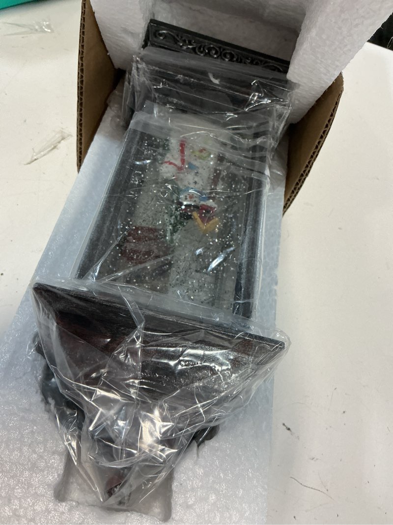 Condition photo showing New/Like New for alpine corporation 11"h indoor lantern snowman snow globe holiday decoration with led light, silver , christmas decoration 11" h - silver w/ leds