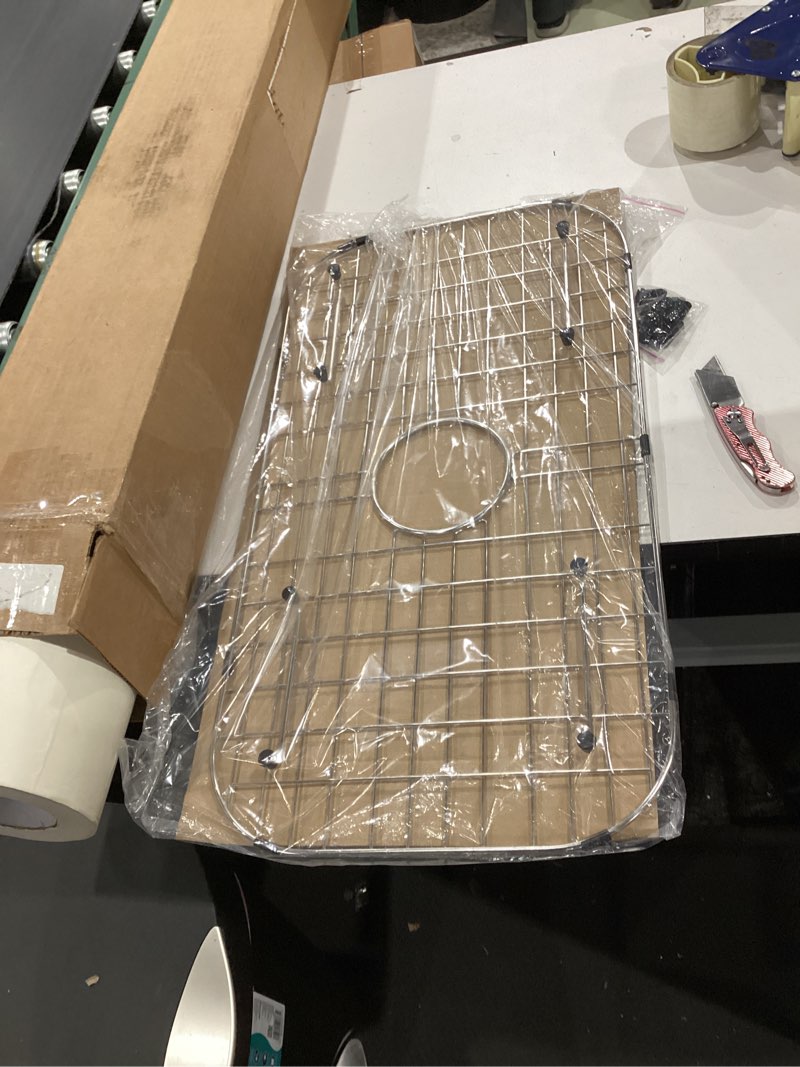 Condition photo showing New/Like New for sink protector grid 26-1/16" x 14-1/16", centered drain with corner radius 3-1/2", 304 stainless steel material (centered drain) for single bowl kitchen sink 26-1/16" x 14-1/16" centered drain