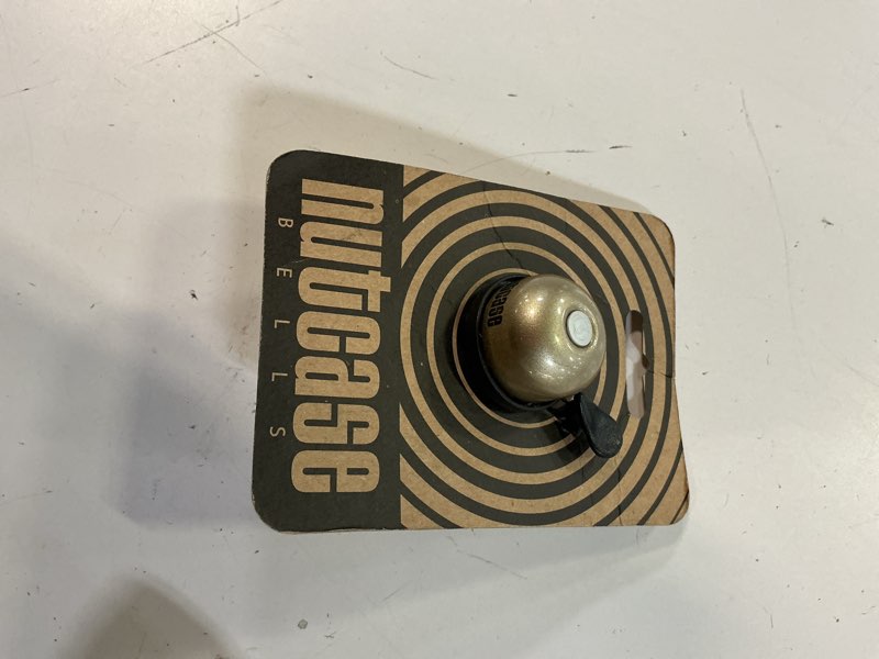 Condition photo showing New/Like New for nutcase, thumbdinger, brass bling