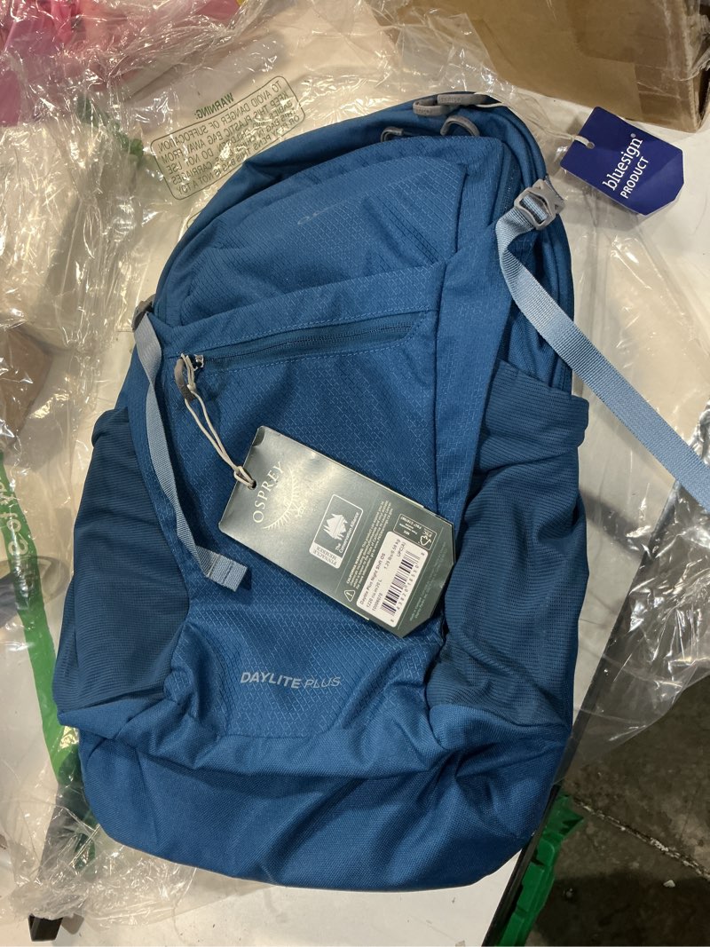 Condition photo showing New/Like New for osprey daylite plus commuter backpack – lightweight, everyday pack with laptop sleeve and water bottle pockets – ideal for work, school, and travel with versatile storage options, night shift blue