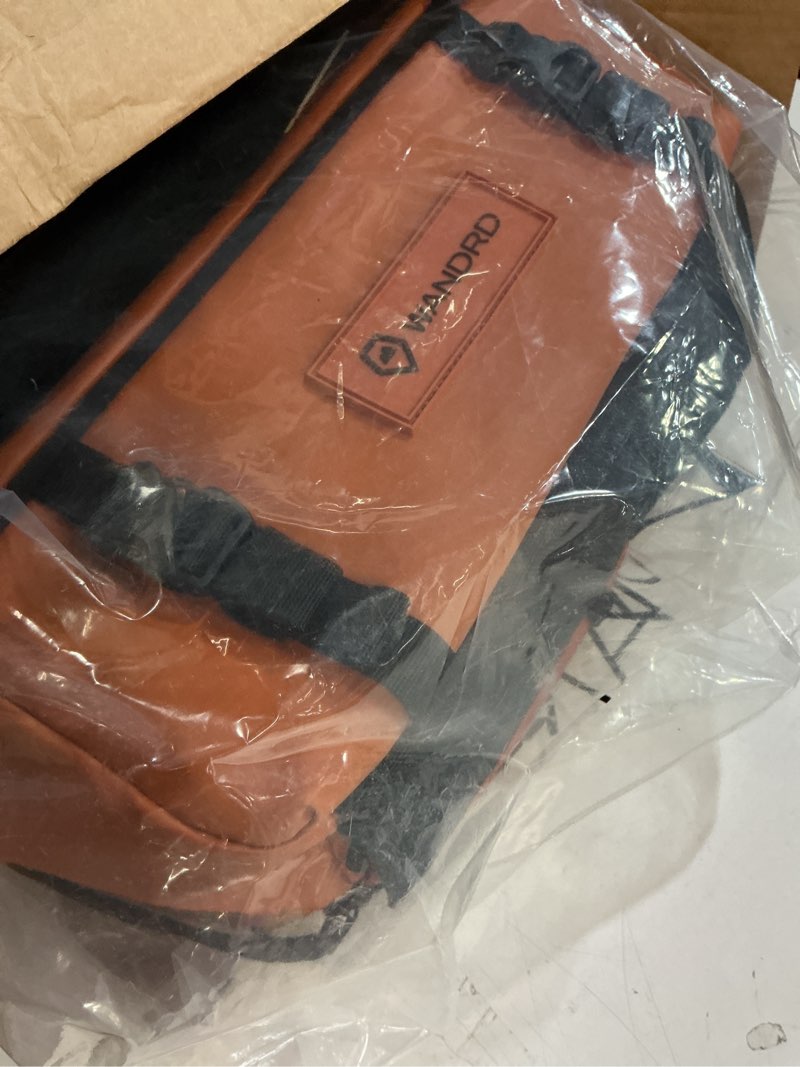 Condition photo showing Good Condition for wandrd rogue v1 9l sling: compact camera sling and crossbody bag with fast access, 3-way carry– lightweight everyday bag great for travel, photography, and daily use (sedona orange) sedona orange 9l