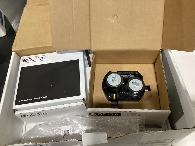 Condition photo showing New/Like New for Delta Modern 14 Series Round Rain Shower System Faucet Set, Rainfall Chrome Shower Head and Handle Set, Valve Trim Kit, 10 Inch, Chrome 342702