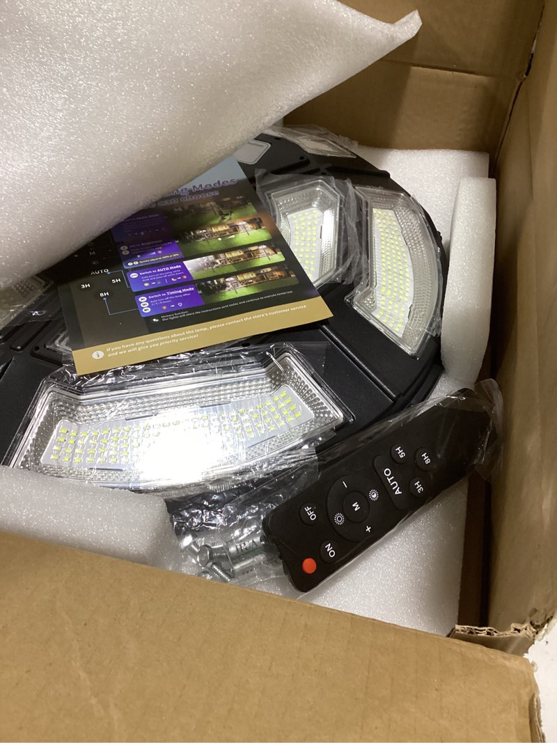 Condition photo showing Good Condition for Outdoor Solar Lamp Post Light with Motion Sensor, Dusk to Dawn IP65 Waterproof, 750 LEDs Solar Powered Lamp Pole Light Fixture with Remote for Garden, Yard, Pathway, Street Outdoor Lighting Head