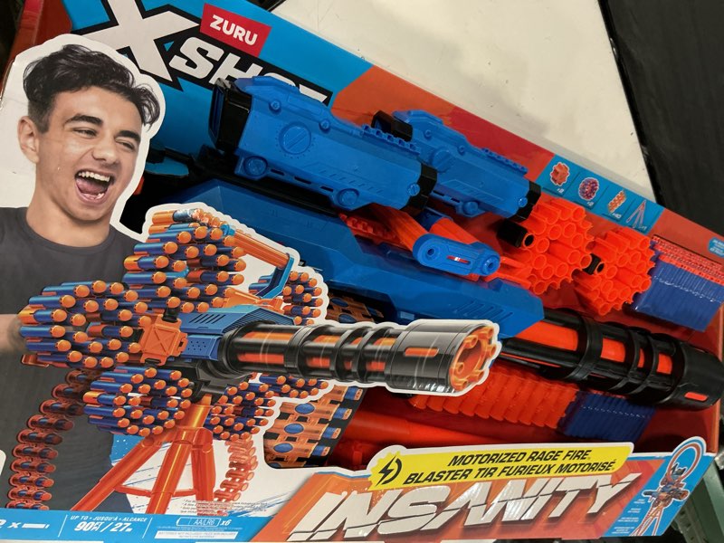 Condition photo showing New/Like New for x-shot insanity motorized rage fire by zuru 72 darts, air pocket technology darts, dart storage, blasting power, auto feeding belt, tripod & scope, outdoor toy for boys, girls, teens, adults