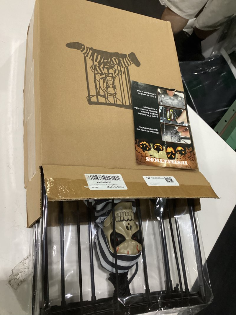 Condition photo showing Good Condition for screaming animated halloween decorations, halloween decor prop with motion sensor, scary skull cage prisoner haunted house decor, spooky hanging ghost halloween decorations outdoor indoor black ghost