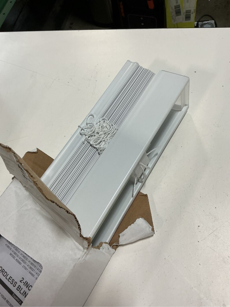 Condition photo showing As Is for project source premium 2-in slat width 27-in x 64-in cordless white vinyl room darkening horizontal blinds