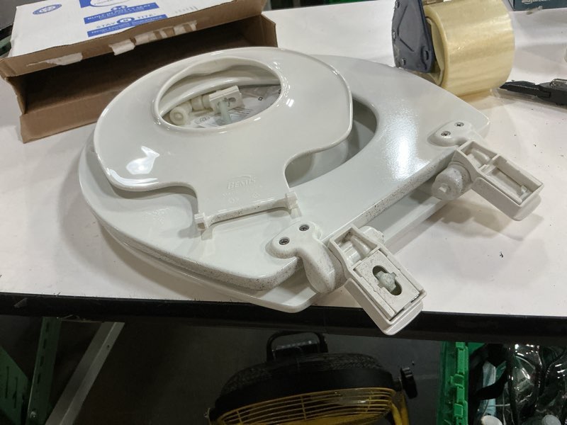 Condition photo showing As Is for mayfair by bemis nextstep2 wood white round soft close toilet seat
