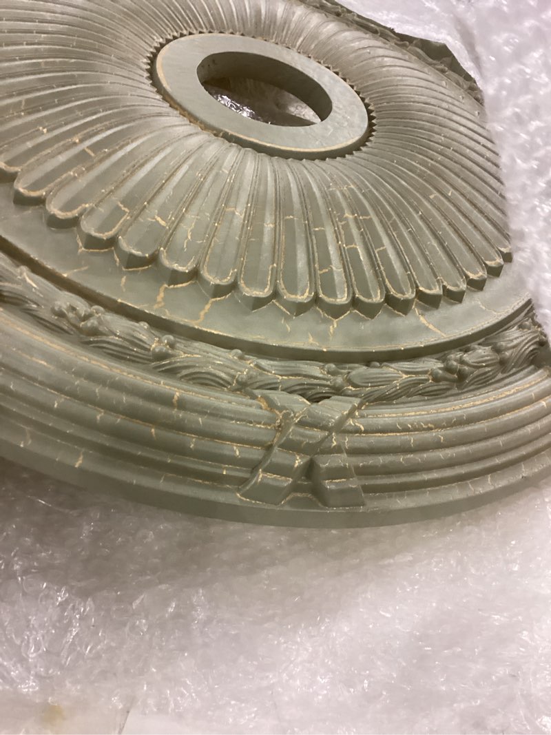 Condition photo showing As Is for Ekena Millwork CM27HEWHC Heaton Ceiling Medallion 27 1/2"OD x 3 7/8"ID x 2 1/4"P (Fits Canopies up to 6 1/2") Hand-Painted Witch Hazel Crackle Witch Hazel Crackle (Flat Finish)