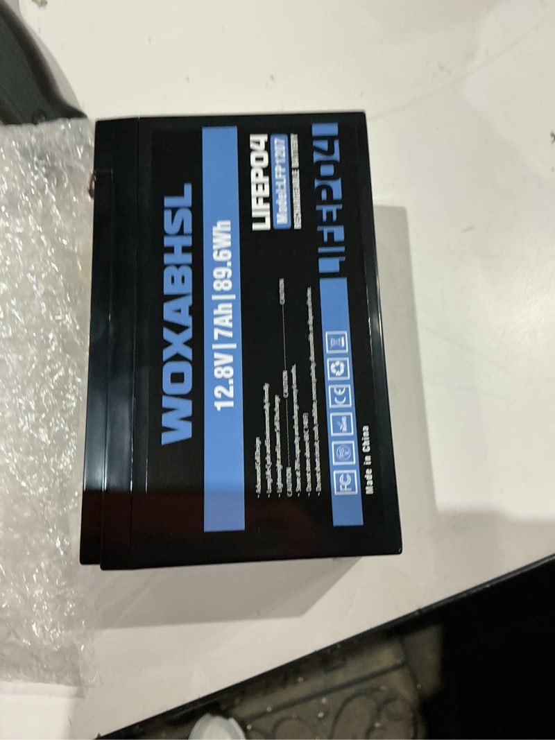 Condition photo showing As Is for 12v 7ah lifepo4 deep cycle battery - 2000+ cycles, direct replacement for 6fm7 sla, built-in bms, lightweight for solar systems, power wheels, ride-on toys, fish finder & home alarms 12.8v 7ah