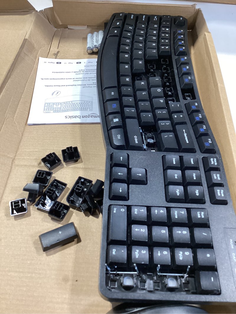 Condition photo showing As Is for amazon basics ergonomic wireless keyboard and mouse combo with wrist rest, plug and play, 2.4 ghz usb, easy to use, black