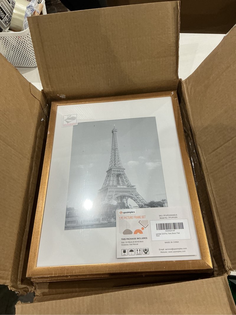 Condition photo showing Good Condition for upsimples 12x16 picture frame, display pictures 8.5x11 with mat or 12x16 without mat, wall hanging photo frame, bronze, 1 pack bronze 12x16