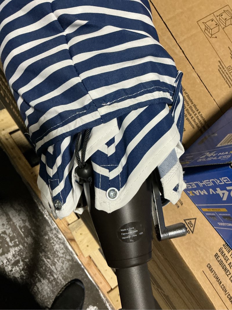 Condition photo showing As Is for allen + roth 9-ft aluminum navy auto-tilt market patio umbrella