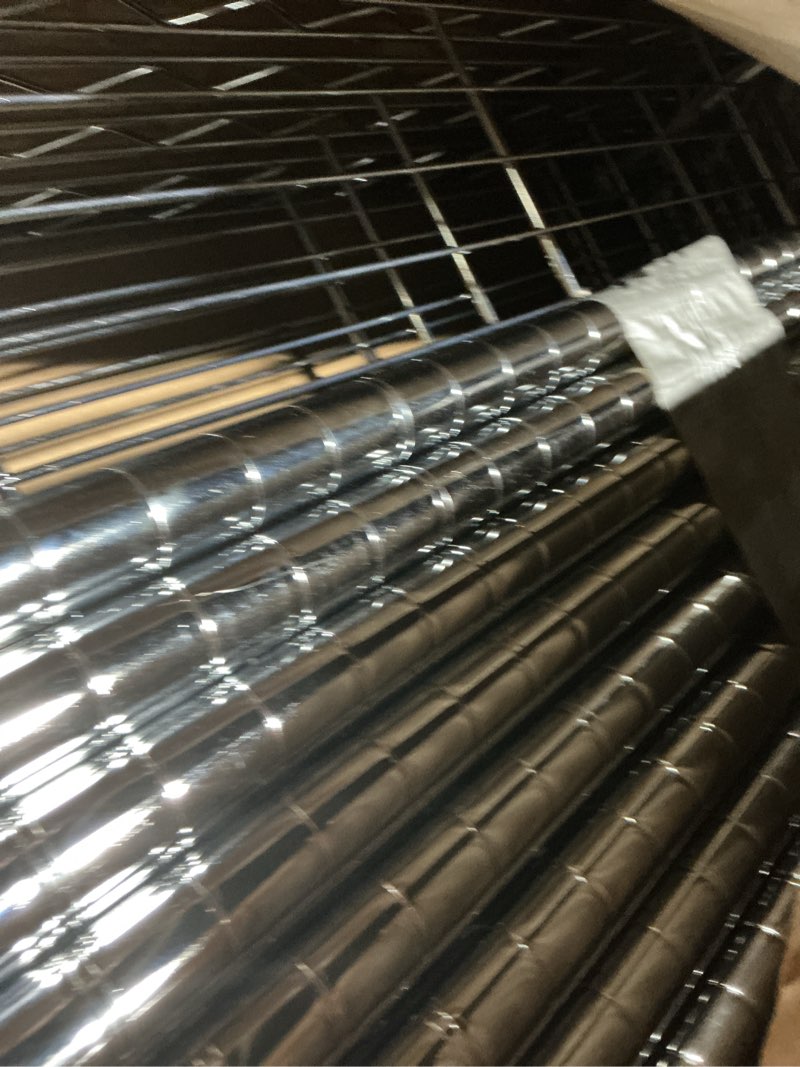 Condition photo showing As Is for Amazon Basics 5-Shelf Adjustable, Heavy Duty Storage Shelving Unit on 4" Wheel Casters, Easy to Move Portable Wire Shelving, No Tools Needed for Easy Assembly, 30" x 14" x 64.8", Chrome 5-Shelf Chrome 30" L x 14" W x 64.8" H