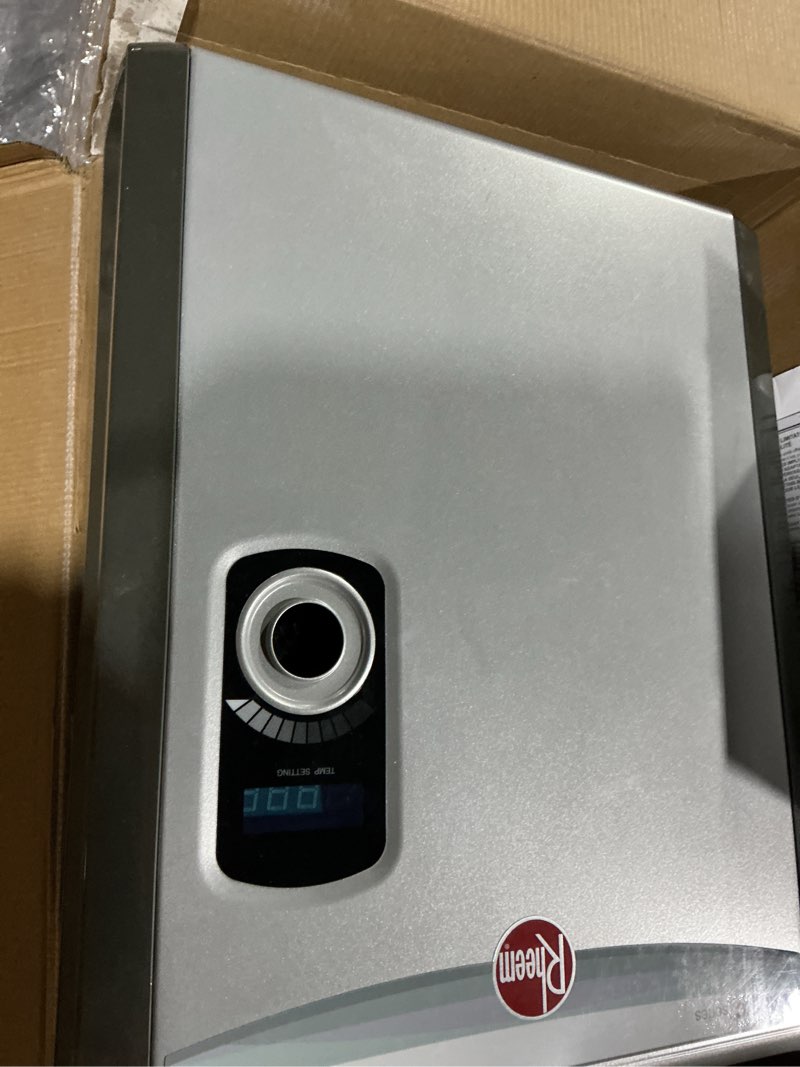 Condition photo showing As Is for Rheem 18kW 240V Tankless Electric Water Heater, Gray