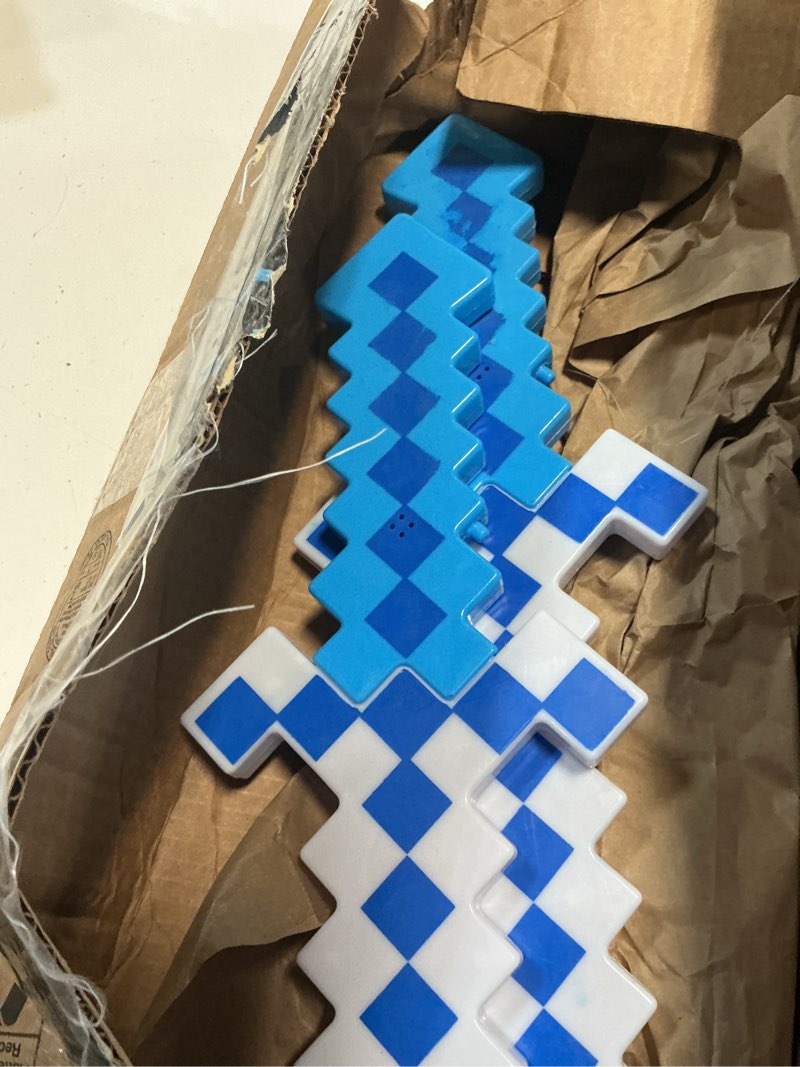 Condition photo showing As Is for fun central 2-pack led 24” light-up blue pixel 8-bit toy swords for kids – flashing light set, gamer stocking stuffers & party accessories 24" blue