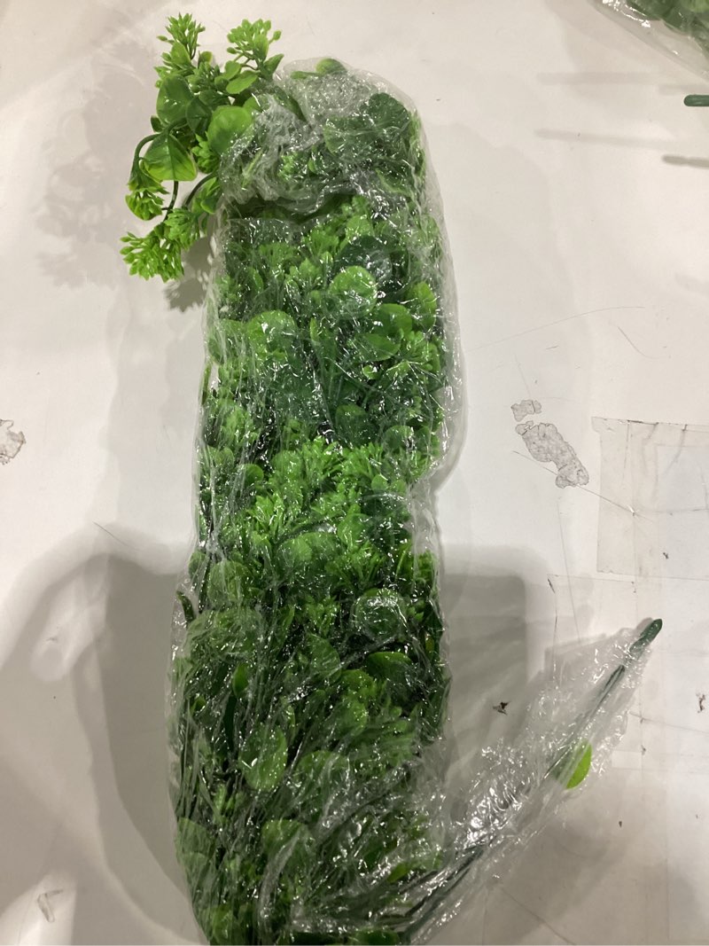 Condition photo showing Good Condition for artificial plastic greenery garland