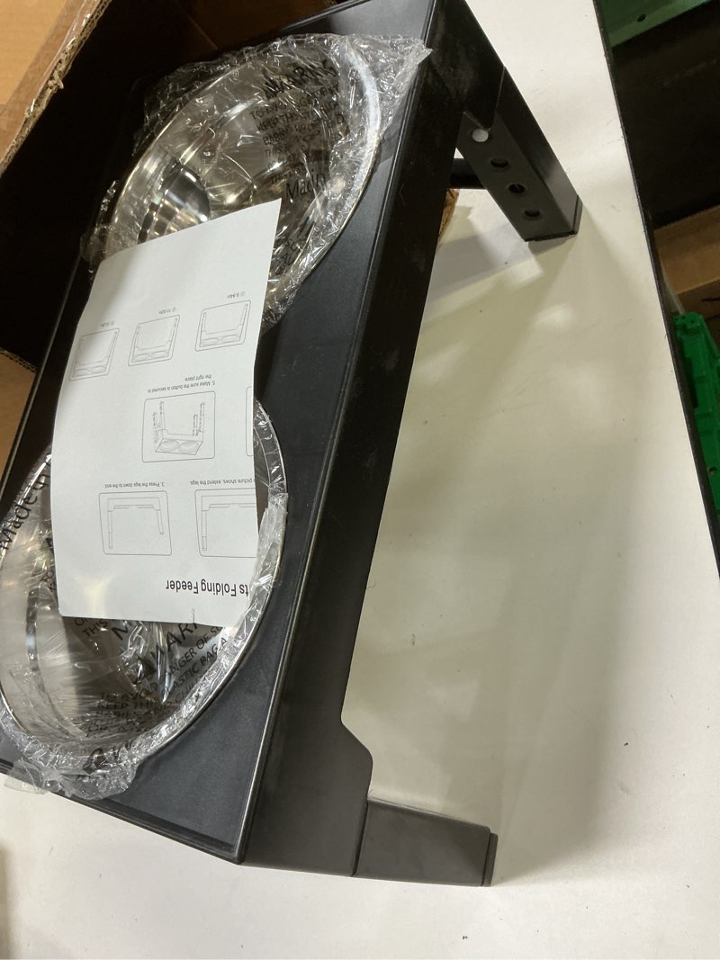 Condition photo showing New/Like New for niubya elevated dog bowls with 2 stainless steel dog food bowls, raised dog bowl adjusts to 5 heights (3.15", 8.66", 9.84",11.02", 12.2") for small medium and large dogs black round bowls
