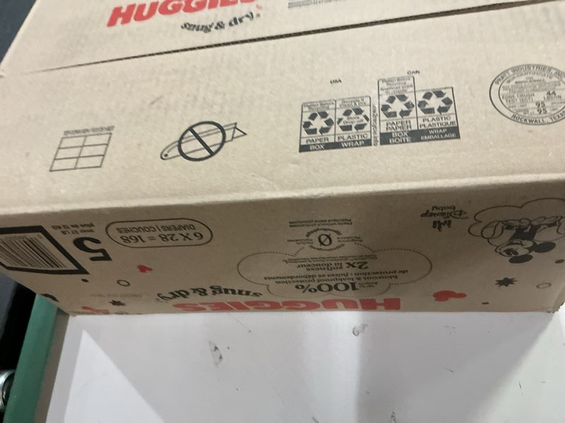 Condition photo showing New/Like New for huggies snug & dry diapers - size 5 - 168ct
