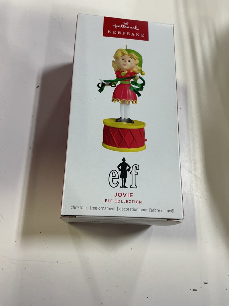 Condition photo showing New/Like New for hallmark keepsake christmas ornament, elf collection jovie with light and sound, christmas movie gif