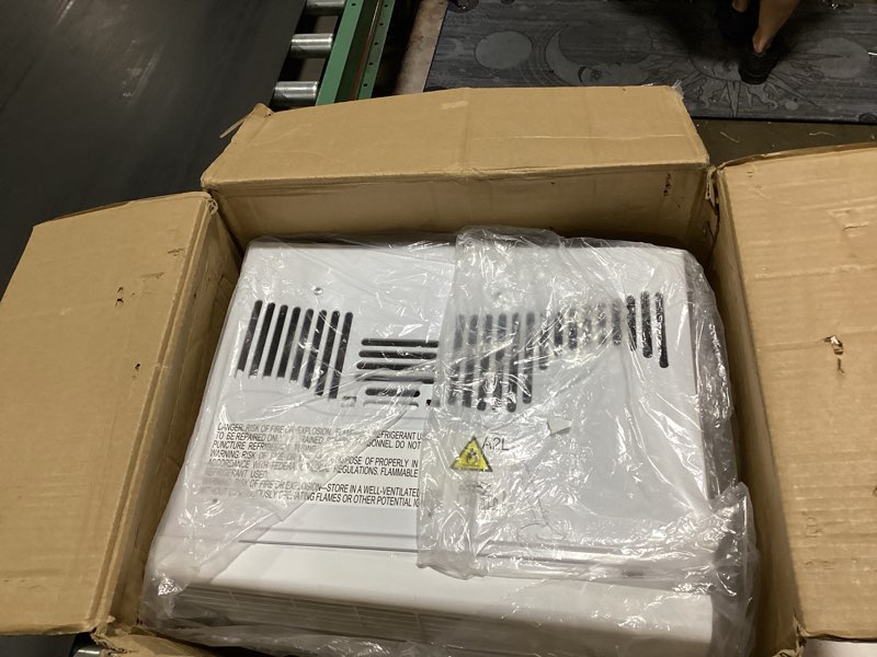 Condition photo showing As Is for ge 6,000 btu electronic window air conditioner, cools rooms up to 250 sq ft, digital controls with remote, energy saver mode, 24hr timer, easy install kit included, white new 6,000 btu electronic controls white