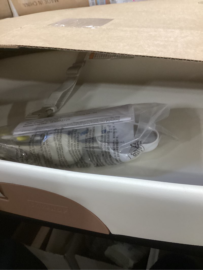 Condition photo showing Good Condition for skip hop baby changing pad nursery style wipe-clean contoured with cushioned foam, non-skid base, built-in safety belt & tuck-away toy bar fits standard changing tables, oat 16" oat