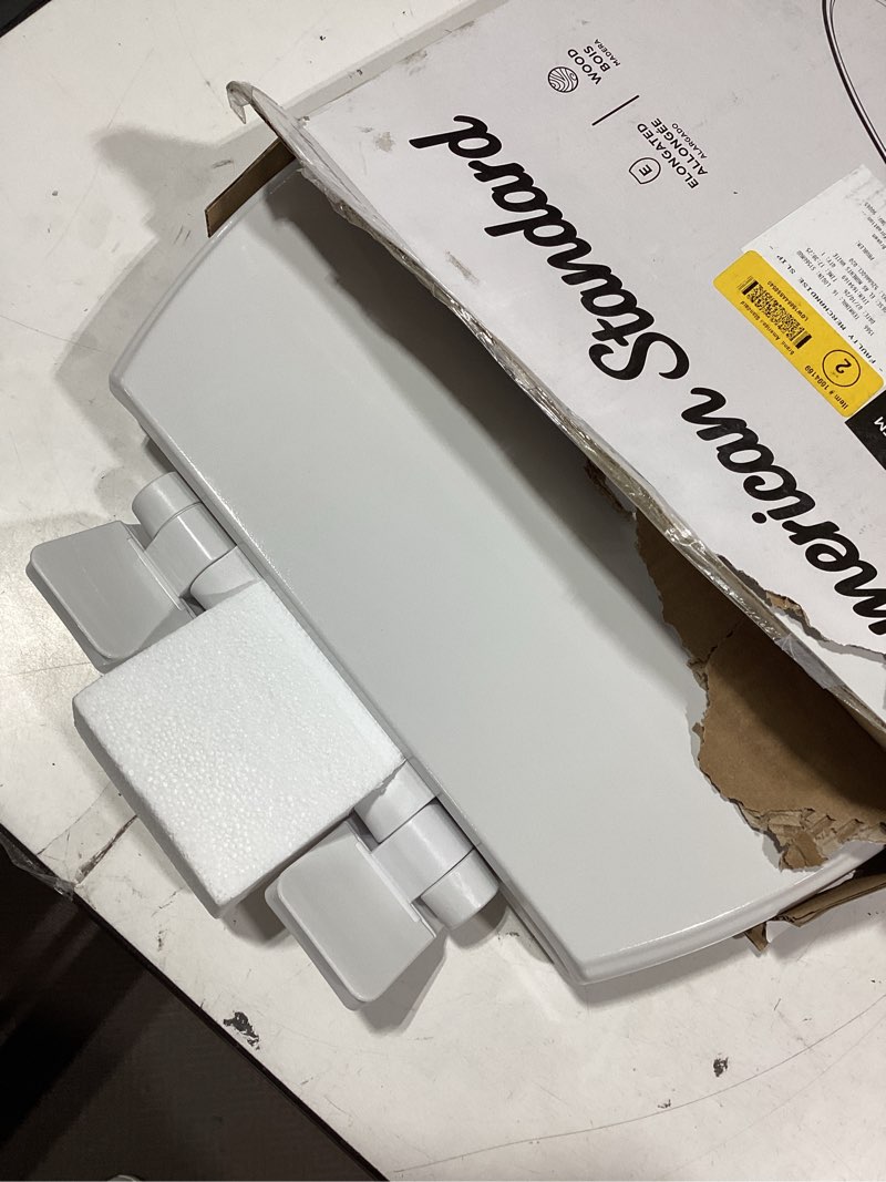 Condition photo showing As Is for american standard moments wood white elongated soft close toilet seat