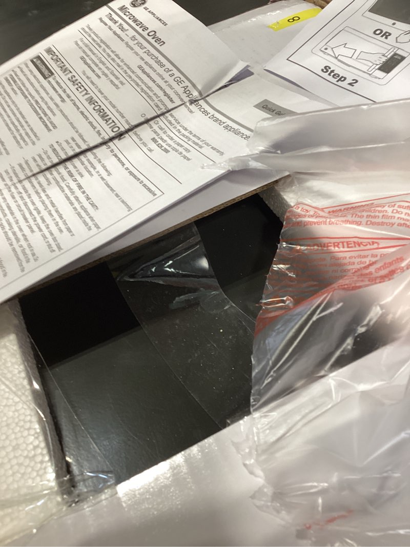 Condition photo showing New/Like New for ge compact countertop microwave oven, 0.7 cubic ft., 700-watt capacity, 6 auto cooking settings, child-lock technology, dorm room or apartment, stainless steel 0.7 cu.ft. stainless steel