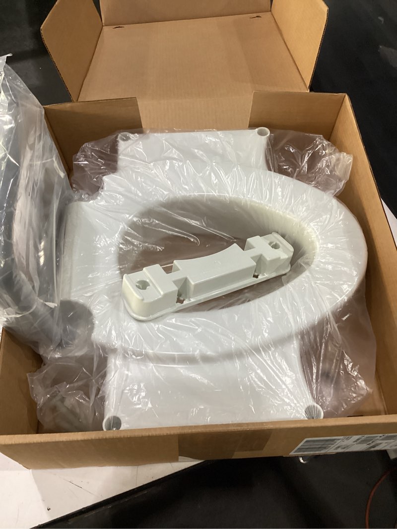 Condition photo showing New/Like New for bemis rise 4.5" raised toilet seat with support handles, hinges never loosen, fits round and elongated raised seat with handles