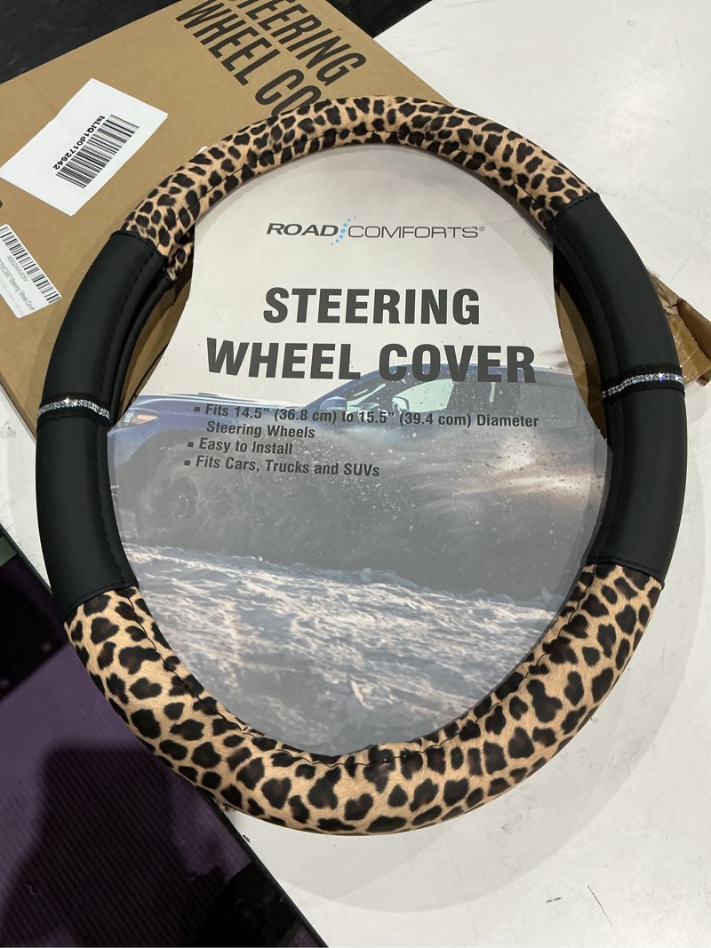 Condition photo showing New/Like New for road comforts leopard steering wheel cover - made with pvc leather cheetah print - anti-slip, universal fit 14 1/2 inches to 15 inches - black
