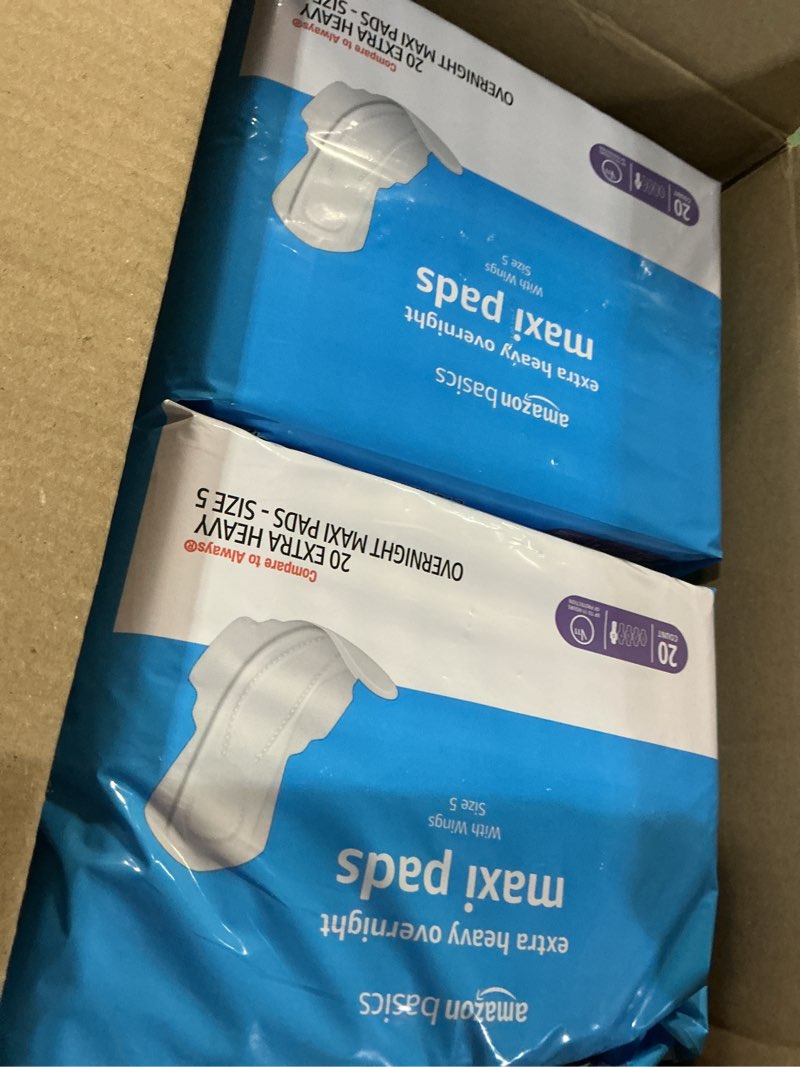 Condition photo showing New/Like New for Amazon Basics Thick Maxi Pads with Wings for Periods - Extra Heavy Overnight Absorbency, Unscented, Size 5, 80 Count (4 Packs of 20) (Previously Solimo) Size 5 80