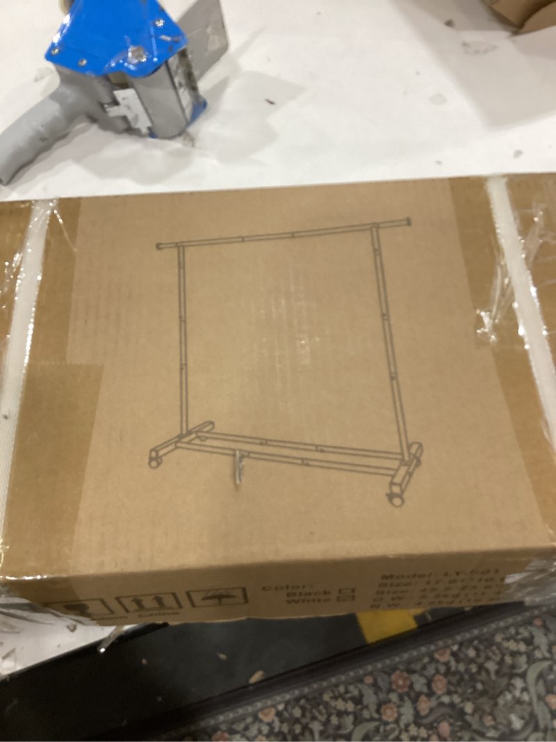 Condition photo showing Good Condition for Clothing Rack, 55.51 Inch Heavy Duty Clothes Rack Rolling Garment Rack with Wheels and Bottom Shelf, 130LB Capacity Clothes Racks for Hanging Clothes, Coats, Shirts, Sweaters, Skirts, White White Single