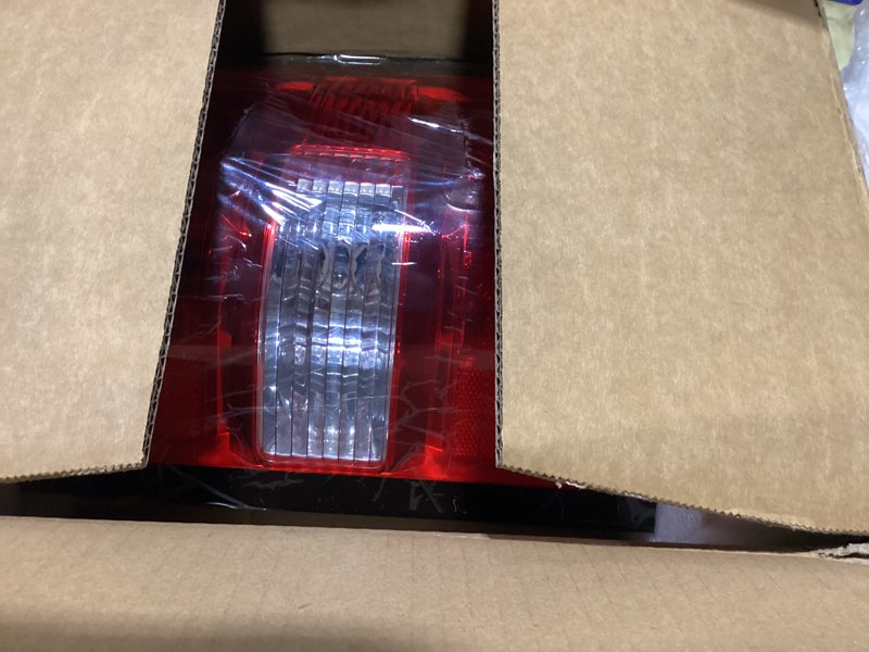 Condition photo showing New/Like New for Boine Right Side Tail Light Compatible With 2009-2018 Dodge Ram 1500 2500 3500 - Bulb Included (Right Passenger Side)