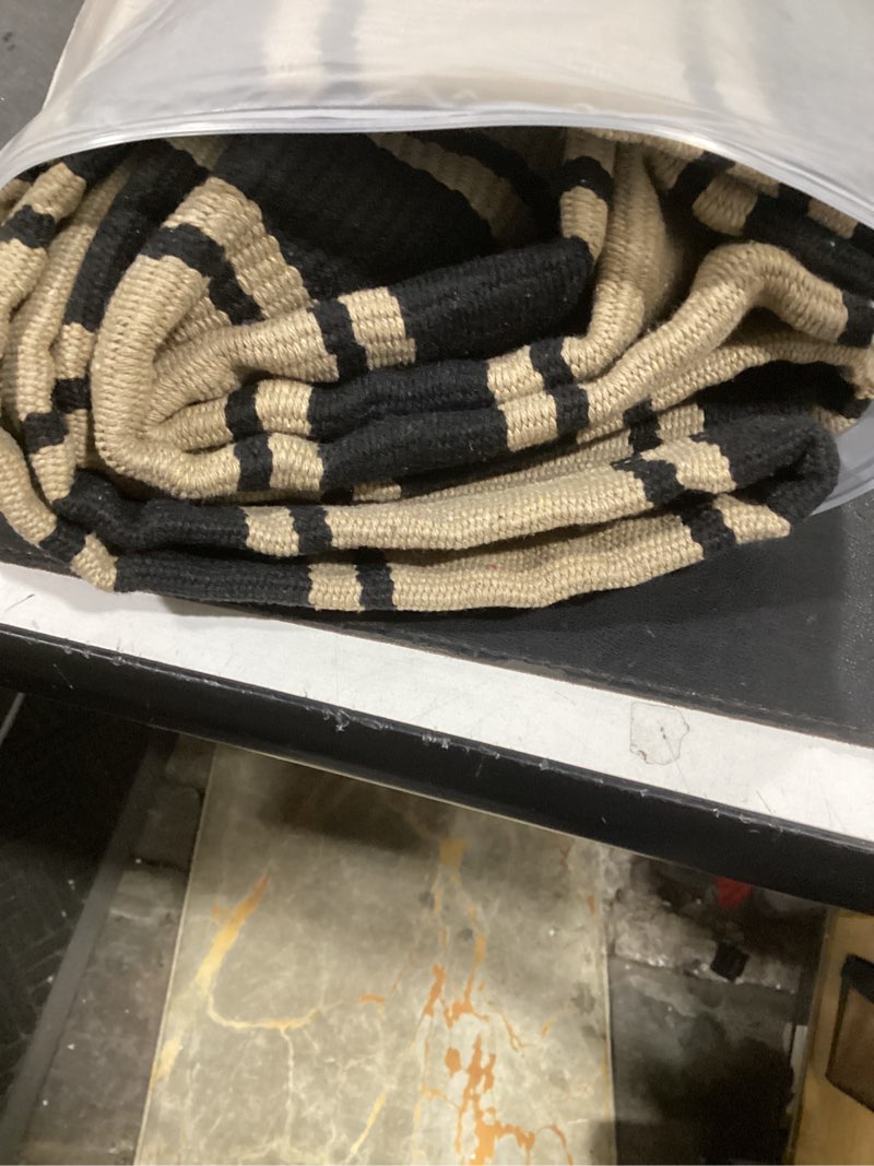 Condition photo showing Good Condition for striped outdoor rug 3'x5', cotton hand woven rug front door mat,washable reversible layered door mats, foldable front porch rug for entryway/home entrance/farmhouse(black and tan) 3'x5' tan and black 1