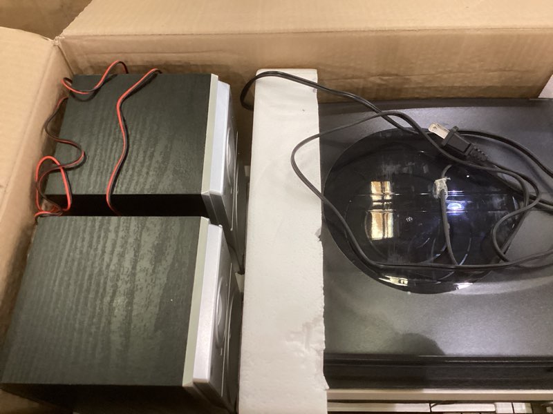 Condition photo showing As Is for Crosley CR7014A-BK Eclipse 3-Speed Turntable with Bluetooth, AM/FM Radio, CD/Cassette Player, USB, SD Card Reader, Aux-in