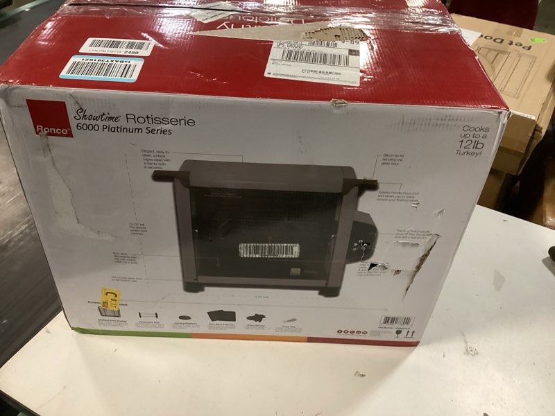 Condition photo showing New/Like New for ronco 6000 platinum series rotisserie oven, digital display, 12-pound capacity, auto shutoff, includes rotisserie spit, multi-purpose basket, 3 cooking functions: rotisserie, sear and no heat rotation new digital 6000 platinum series