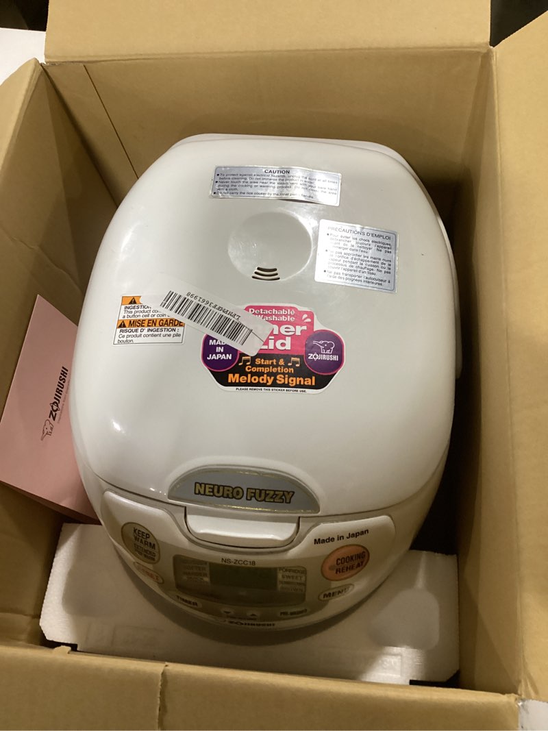 Condition photo showing Good Condition for Zojirushi Neuro Fuzzy 10-Cup Rice Cooker and Warmer (Premium White) 10-Cup uncooked rice