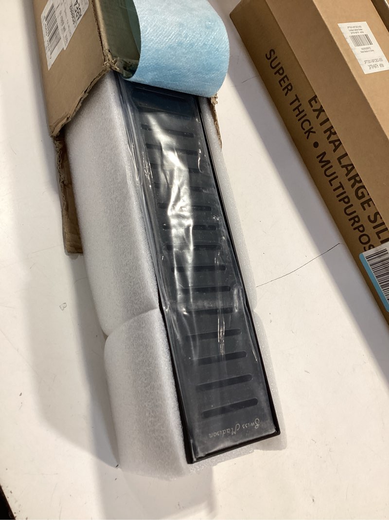 Condition photo showing Good Condition for swiss madison voltaire 24" stainless steel linear shower drain in matte black