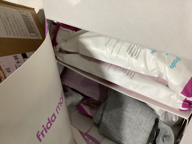 Condition photo showing Good Condition for Frida Mom 11pc Postpartum Essentials Kit Gift Set, Hospital Bag Must Haves for New Mom, Includes 4 Disposable Postpartum Underwear, 4 Ice Maxi Pads, Perineal Healing Foam & 24 Pad Liners & Peri Bottle Postpartum Kit